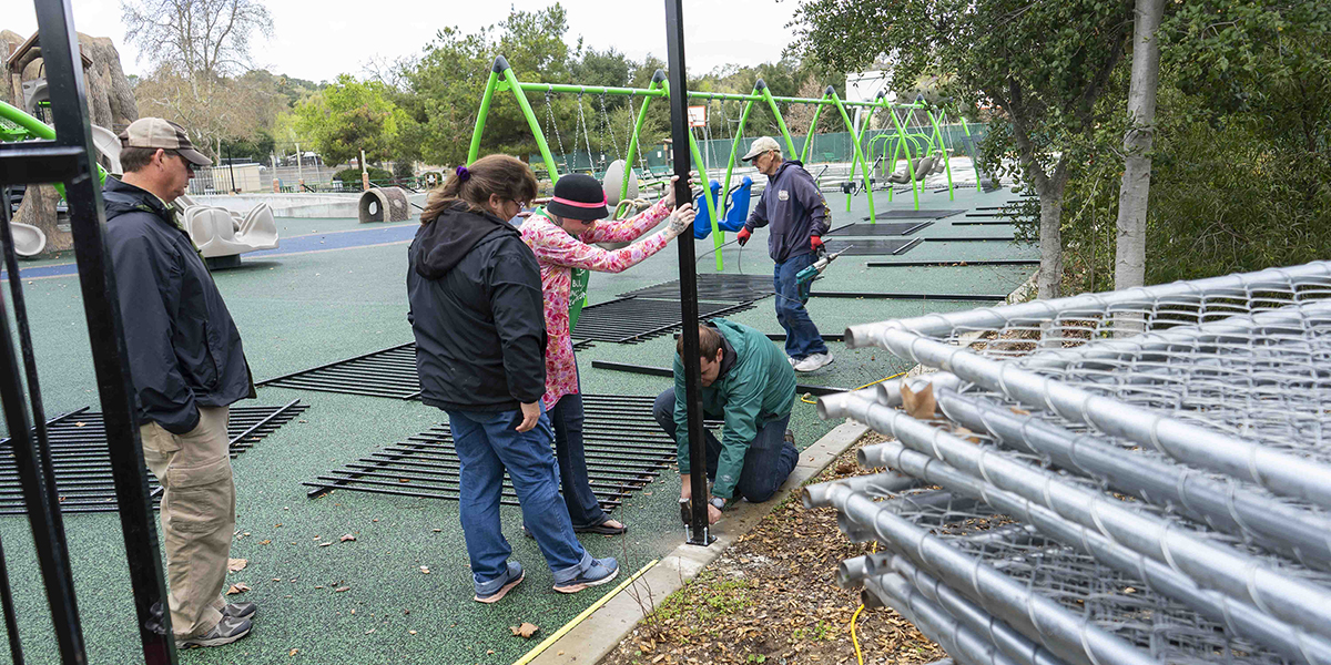 Service Groups Unite to Install Joy Playground Fencing