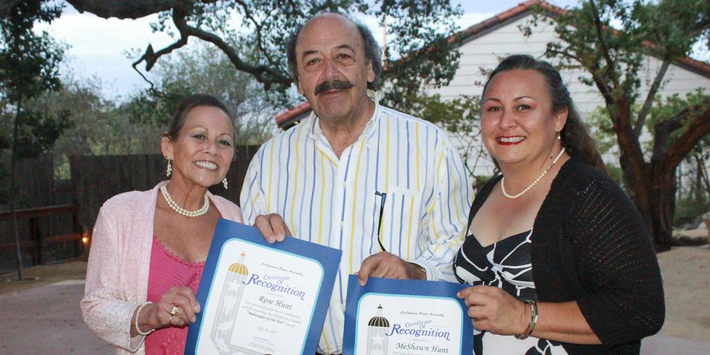 Achadjian presenting Rose Hunt, left, and MeShawn Hunt, right, with Ambassador of the Year awards for the Templeton Chamber of Commerce in 2015. File photo