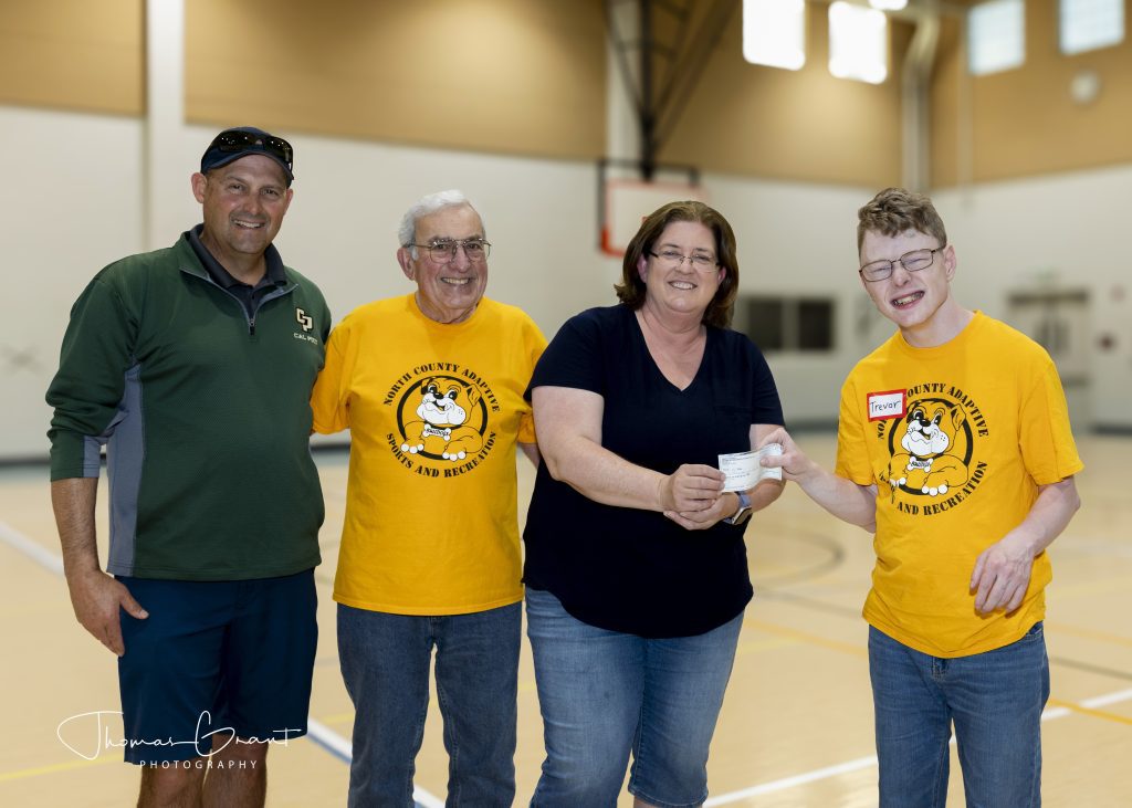 Trevor Dealy Donation Check to Non Profit 1